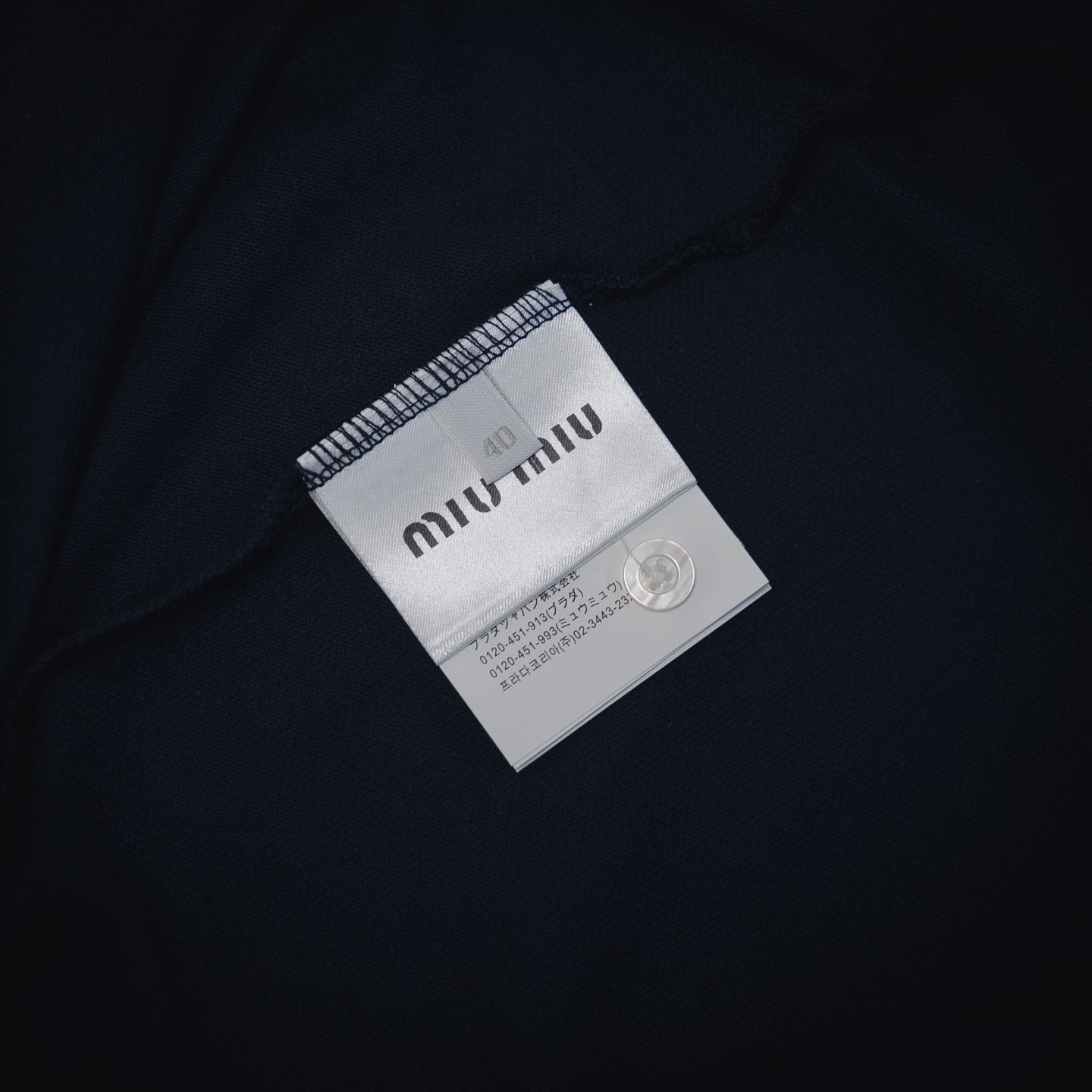 Miu 25ss embroidered polo shirt