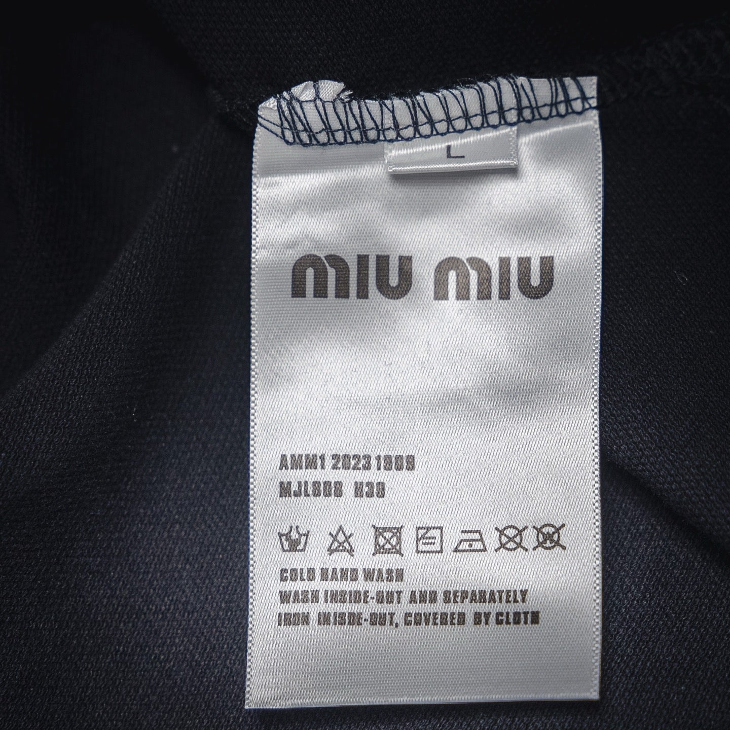 Miu 25ss zipper polo