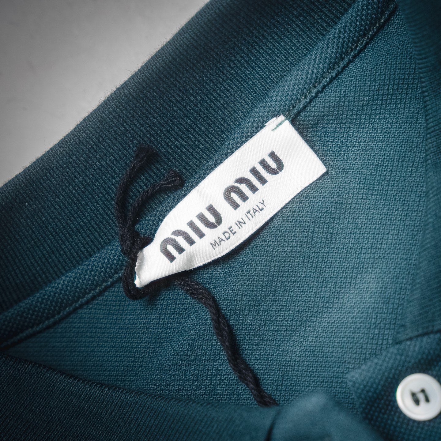 Miu 25ss embroidered polo